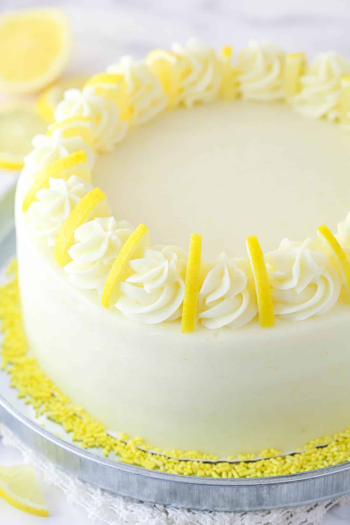 Lemon curd cake on a serving platter.