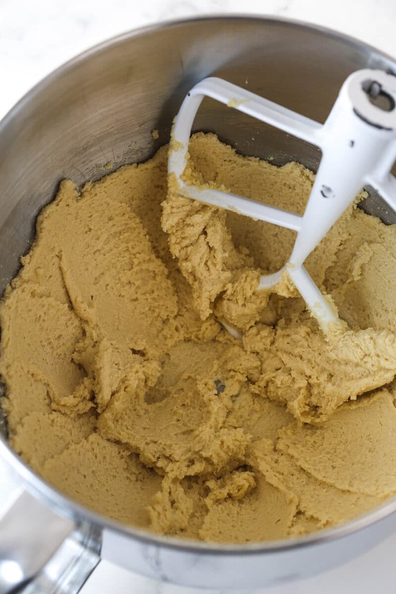 Creaming butter and sugars together for cookie dough.