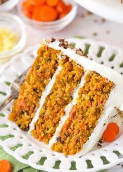 A slice of carrot cake on a plate.