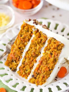 A slice of carrot cake on a plate.