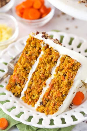 A slice of carrot cake on a plate.