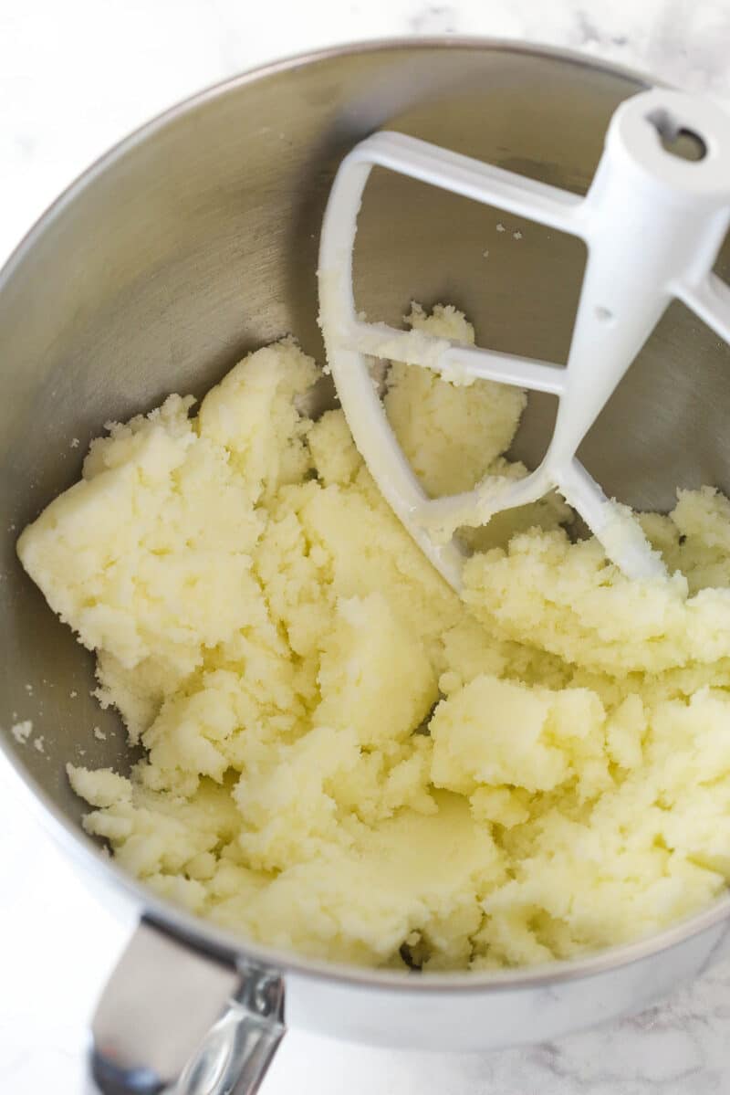 Combining butter and sugar for pumpkin bread.