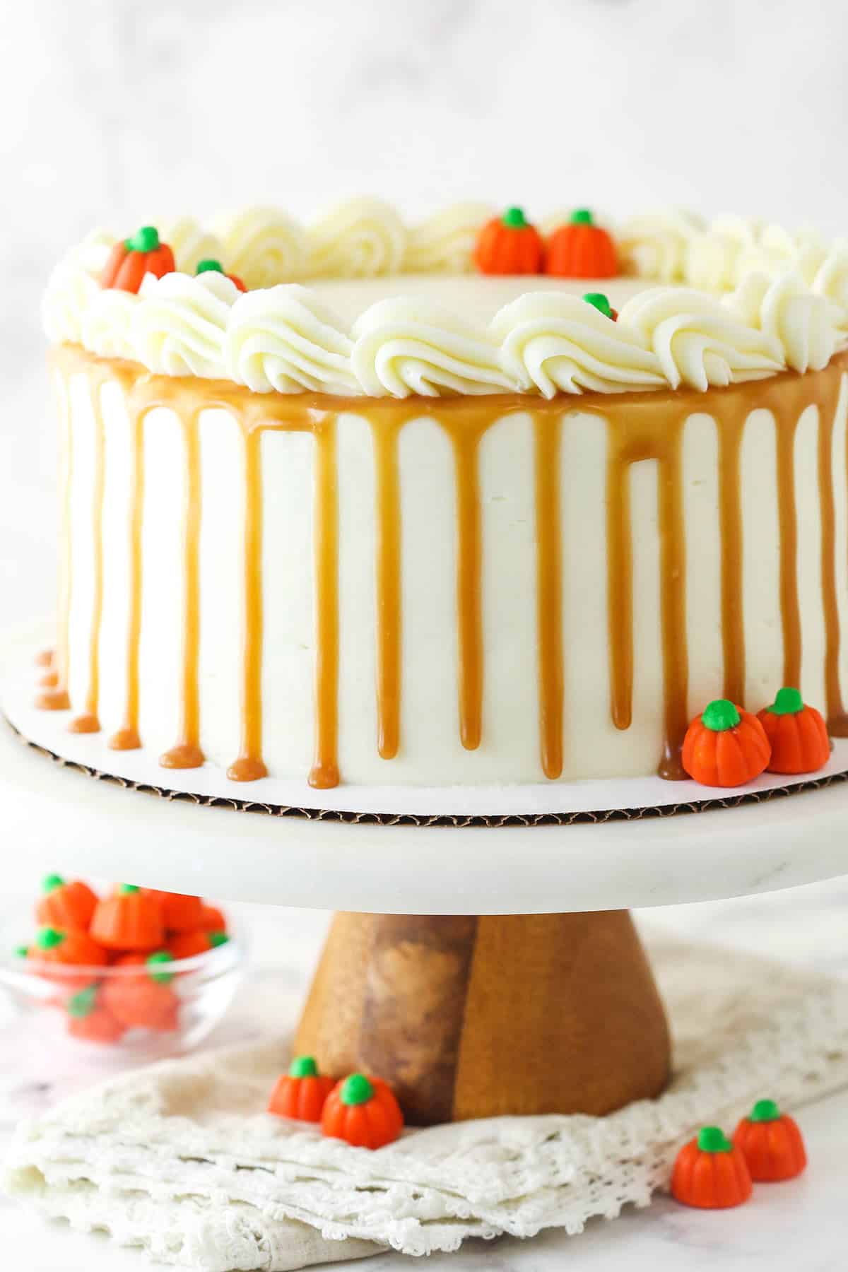Pumpkin layer cake on a cake stand.