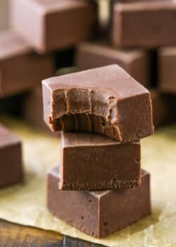 A stack of 3 pieces of chocolate fudge