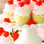 Strawberry Truffle Cupcakes on a white cake stand