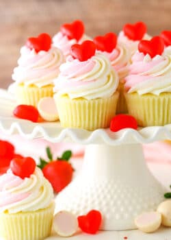 Strawberry Truffle Cupcakes on a white cake stand