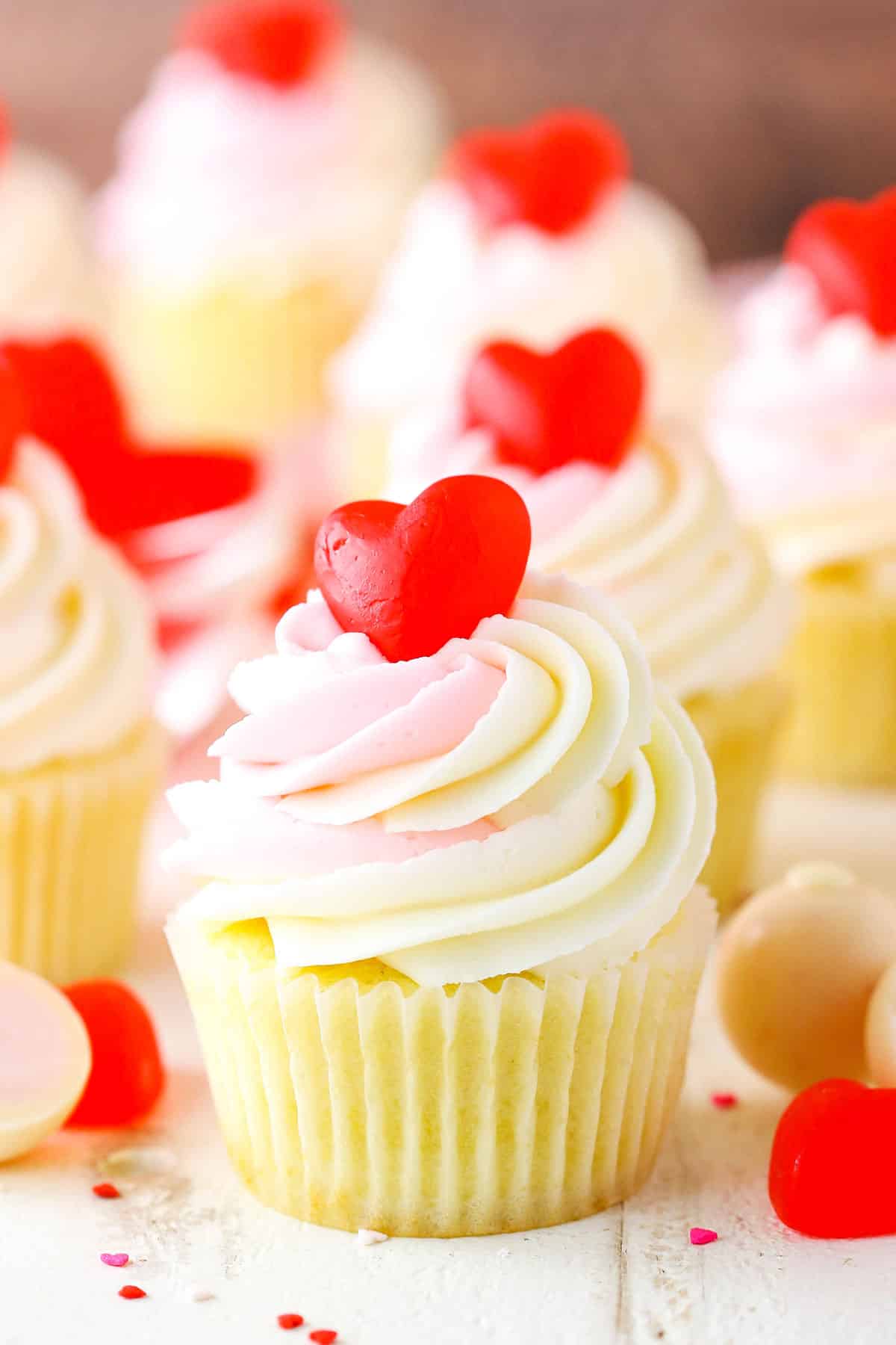 A Strawberry Truffle Cupcake on a white table top