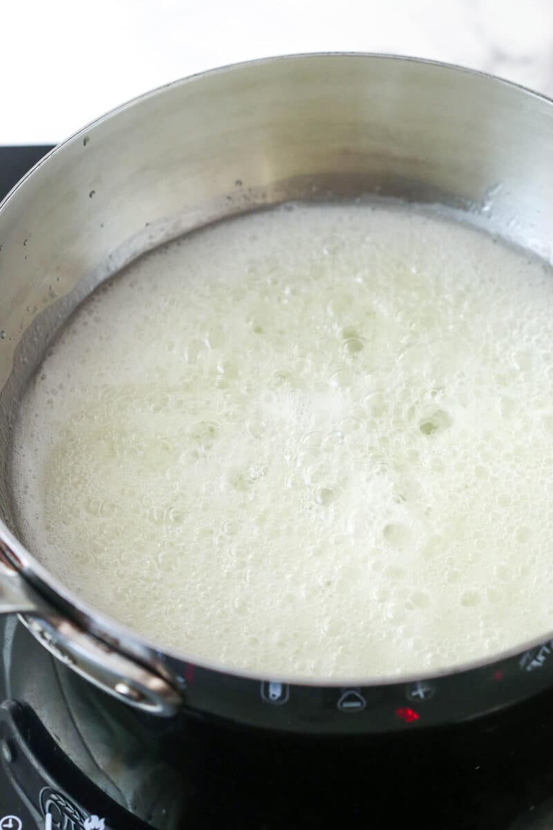 Sugar mixture in a metal pot boiling.