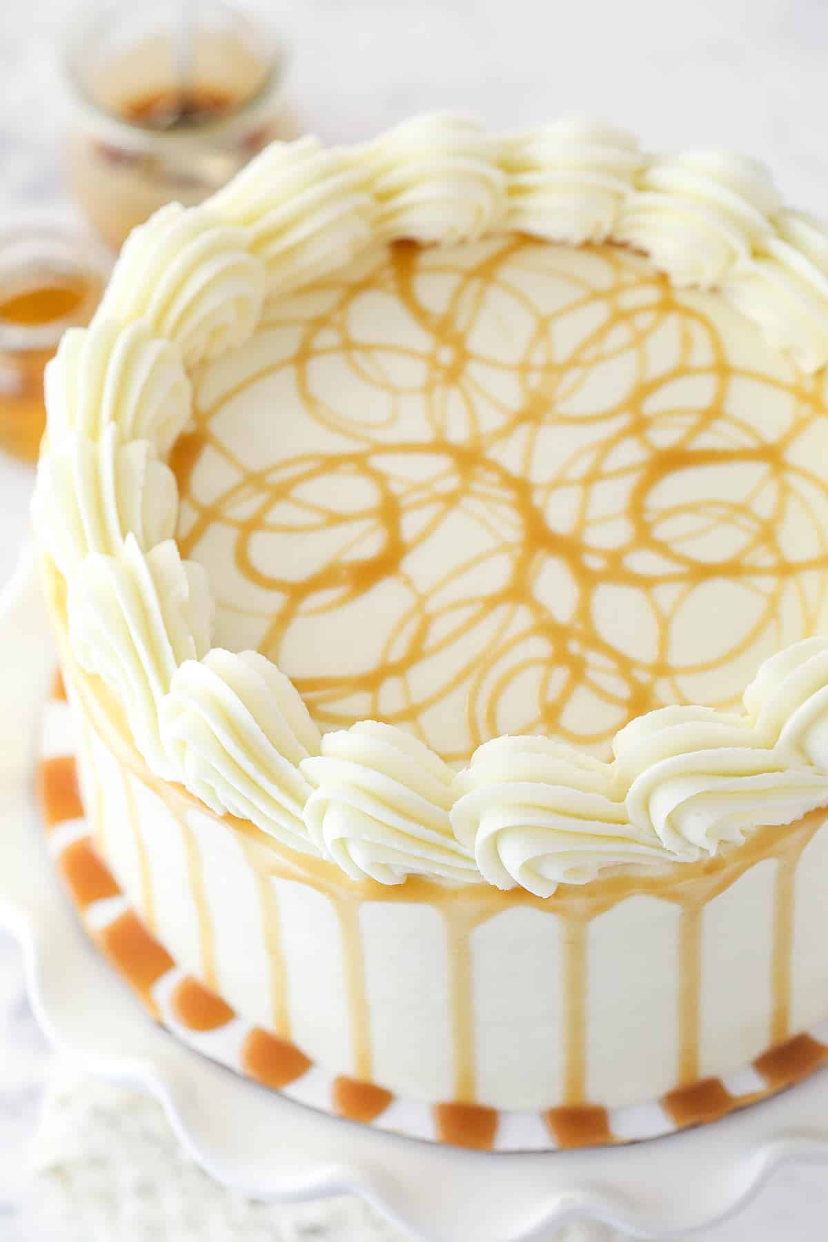 Overhead shot of bourbon cake on a cake stand.