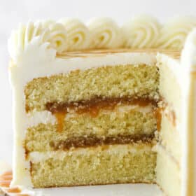 Bourbon cake with a couple of slices taken out of it.