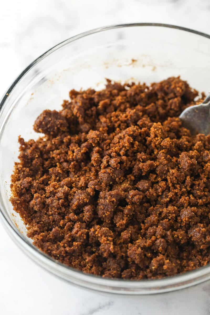 Mixing together butter, cinnamon, sugar, and flour for cinnamon filling.