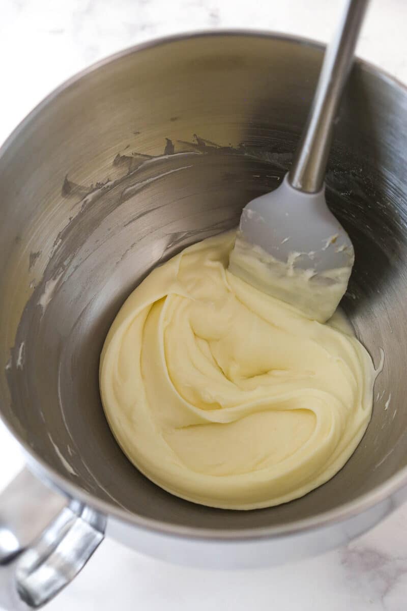 Mixing cream cheese frosting.
