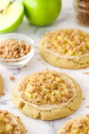 Close up of a fully decorated Copycat Crumbl Apple Crumb Cake Cookie.