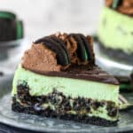 A slice of mint Oreo cheesecake.