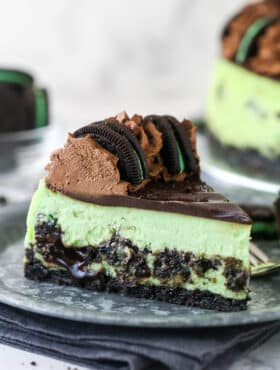 A slice of mint Oreo cheesecake.