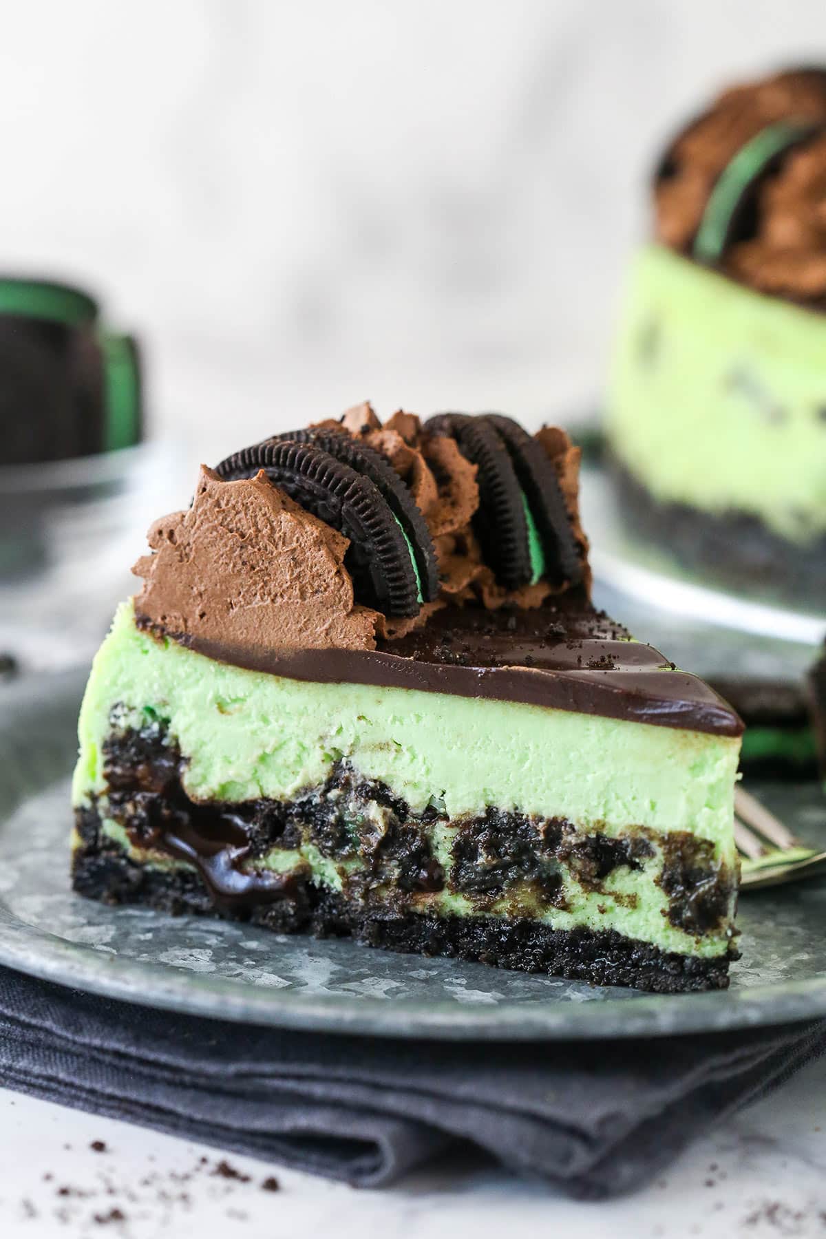 A slice of mint Oreo cheesecake.