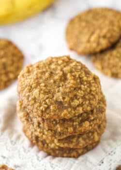 Top view of 6 Moist and Chewy Banana Oatmeal Cookies stacked one on top of the other.