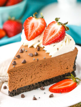 A slice of No Bake Chocolate Cheesecake on a small white plate.