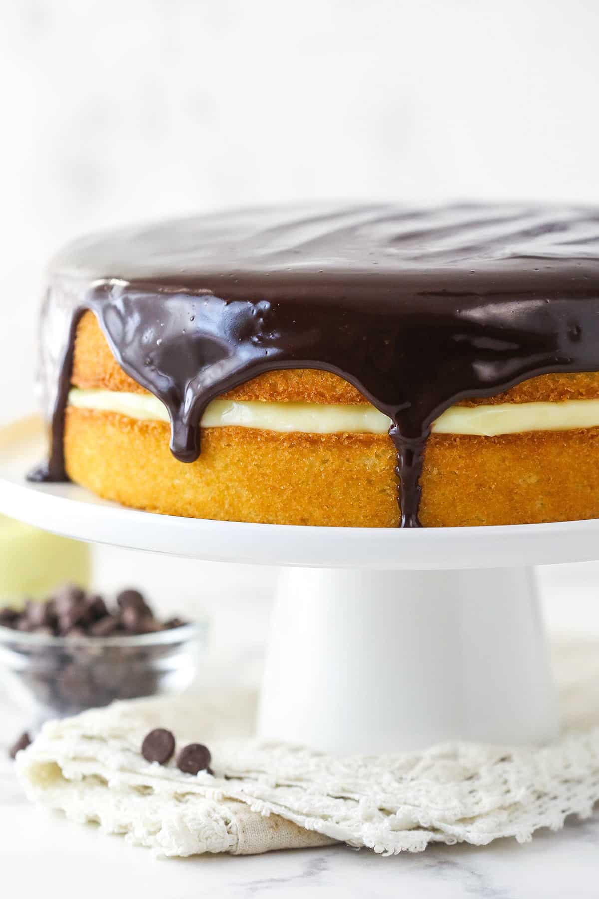 Boston cream pie on a cake stand.