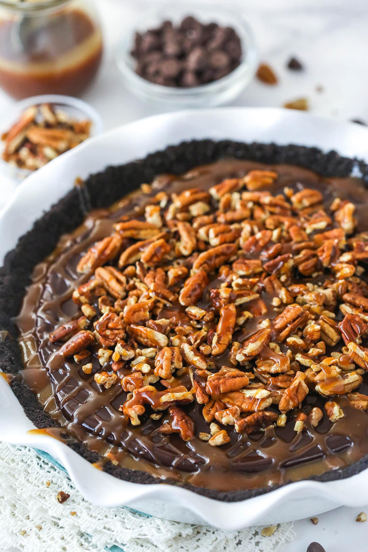 Caramel turtle pie in a pie dish.