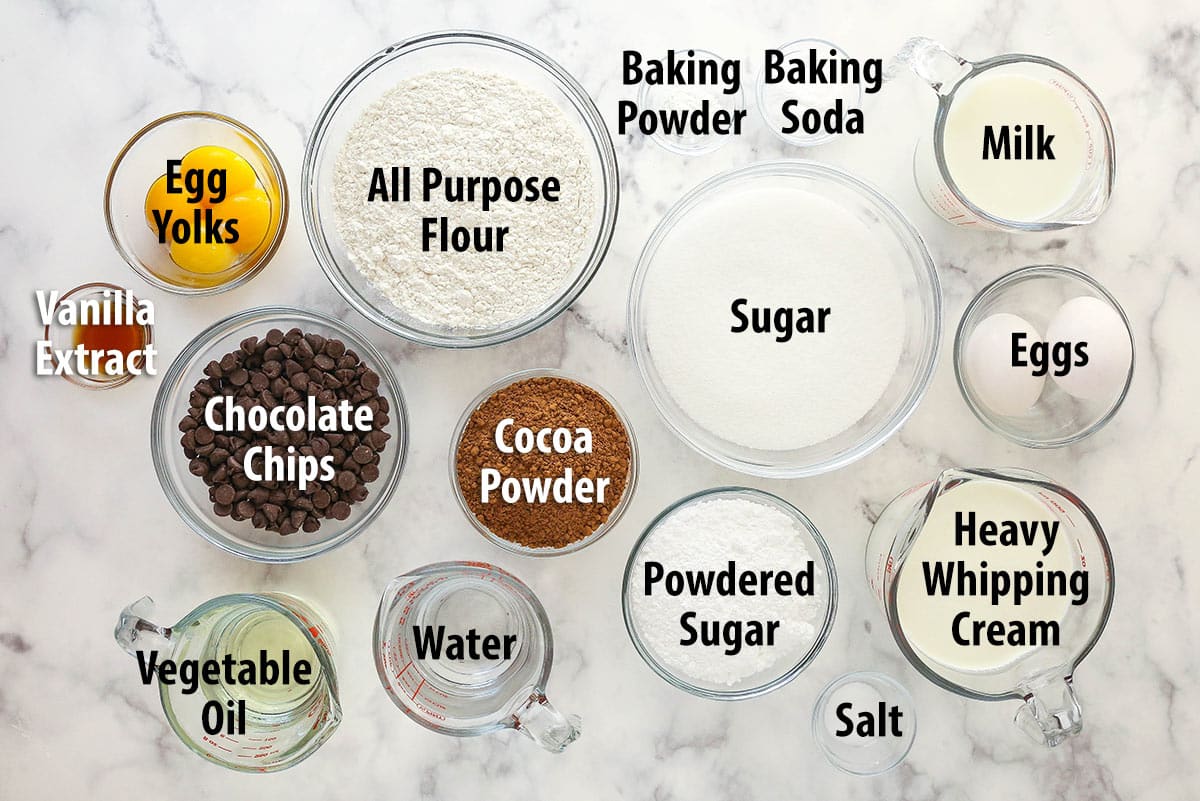 Ingredients for chocolate mousse cake separated into bowls.