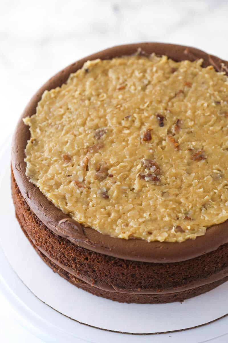 Filling German chocolate cake with coconut pecan filling.