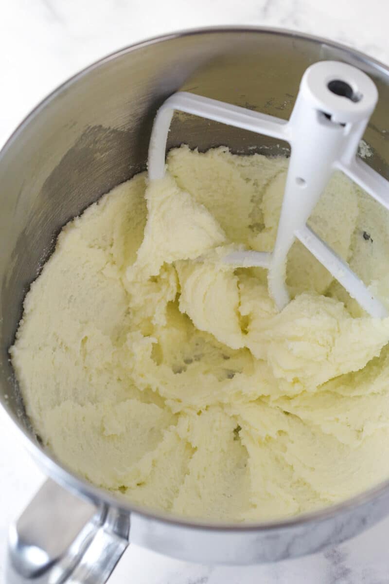 Creaming together butter and sugar for cake batter.