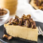 A slice of Reese's peanut butter pie on a plate with a fork.