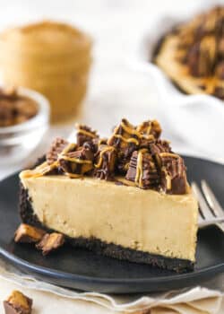 A slice of Reese's peanut butter pie on a plate with a fork.
