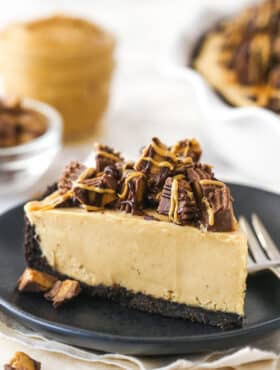 A slice of Reese's peanut butter pie on a plate with a fork.