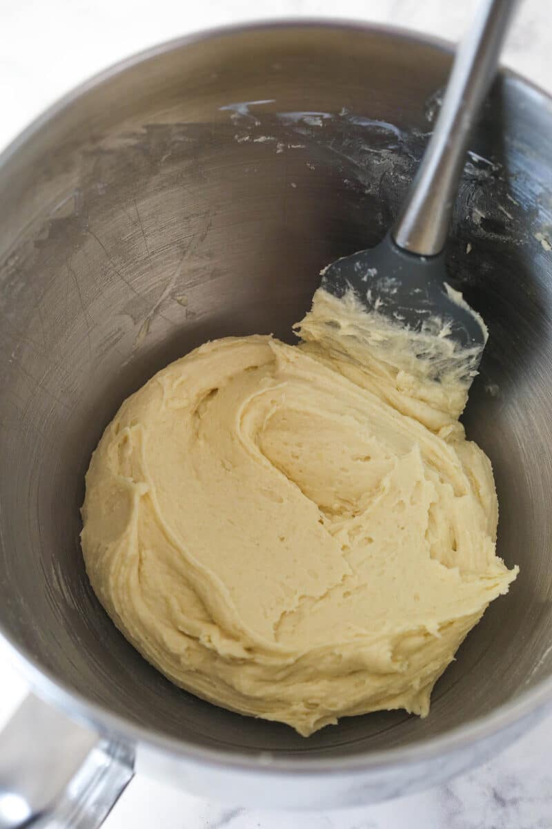 Black and white cookie dough in a mixing bowl.