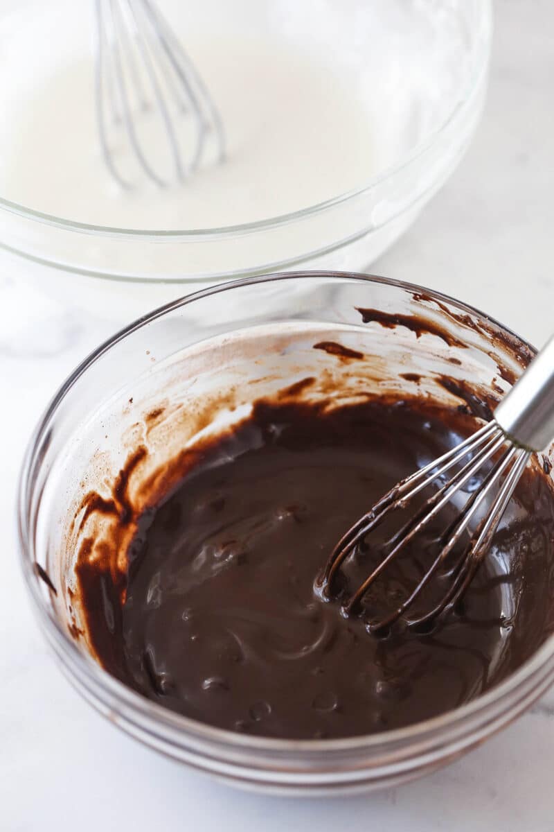 Whisking the "black" frosting for black and white cookies.