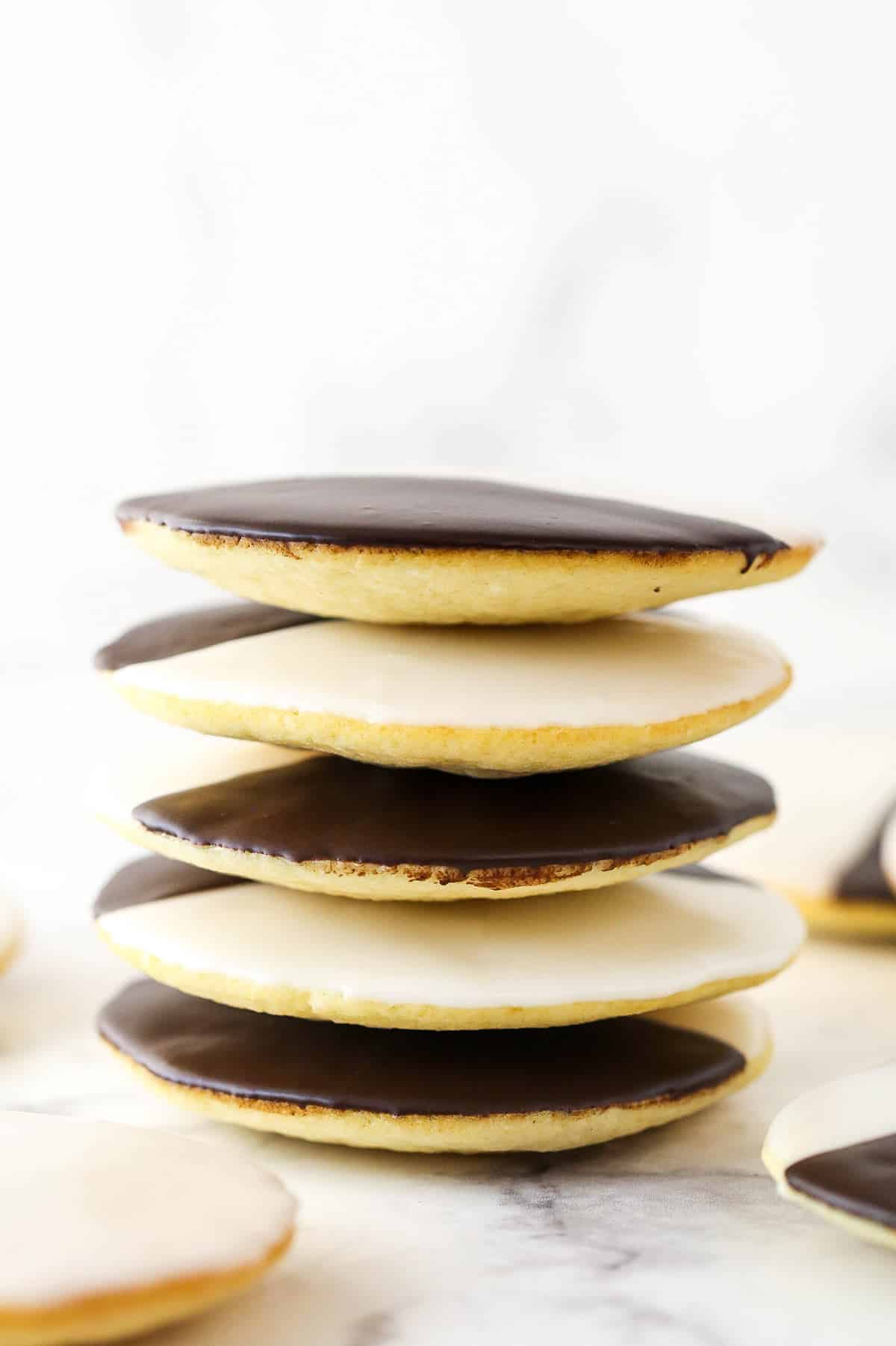 A stack of black and white cookies.