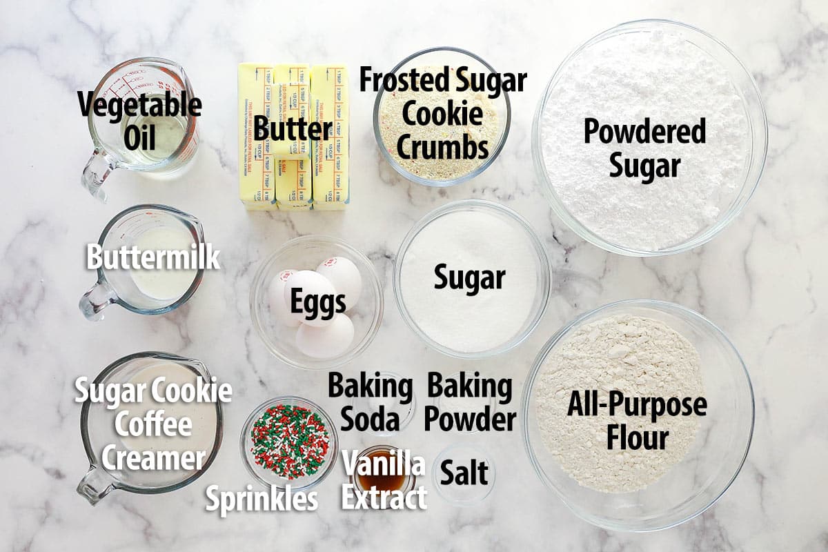 Labeled ingredients needed for a Frosted Sugar Cookie Layer Cake.