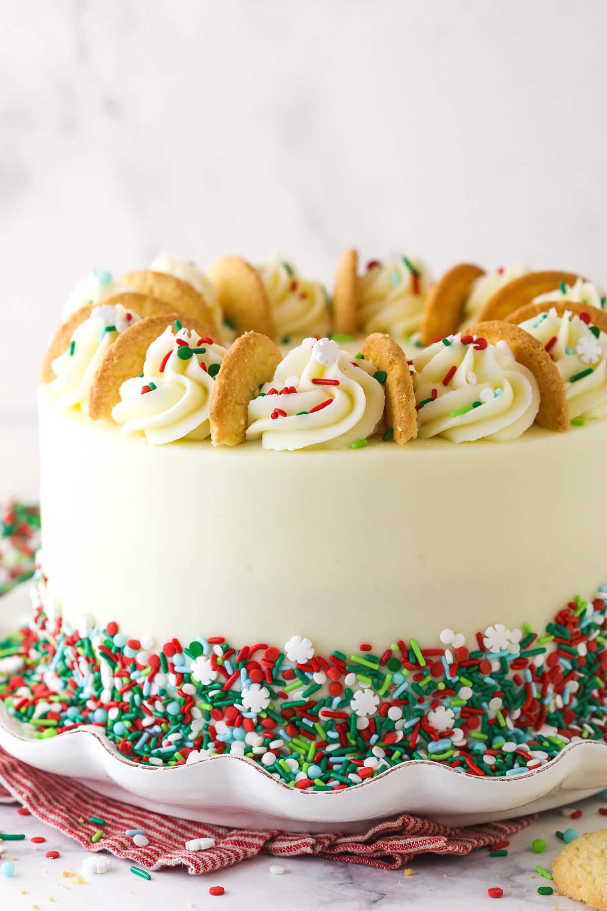 The side of a Frosted Sugar Cookie Layer Cake.