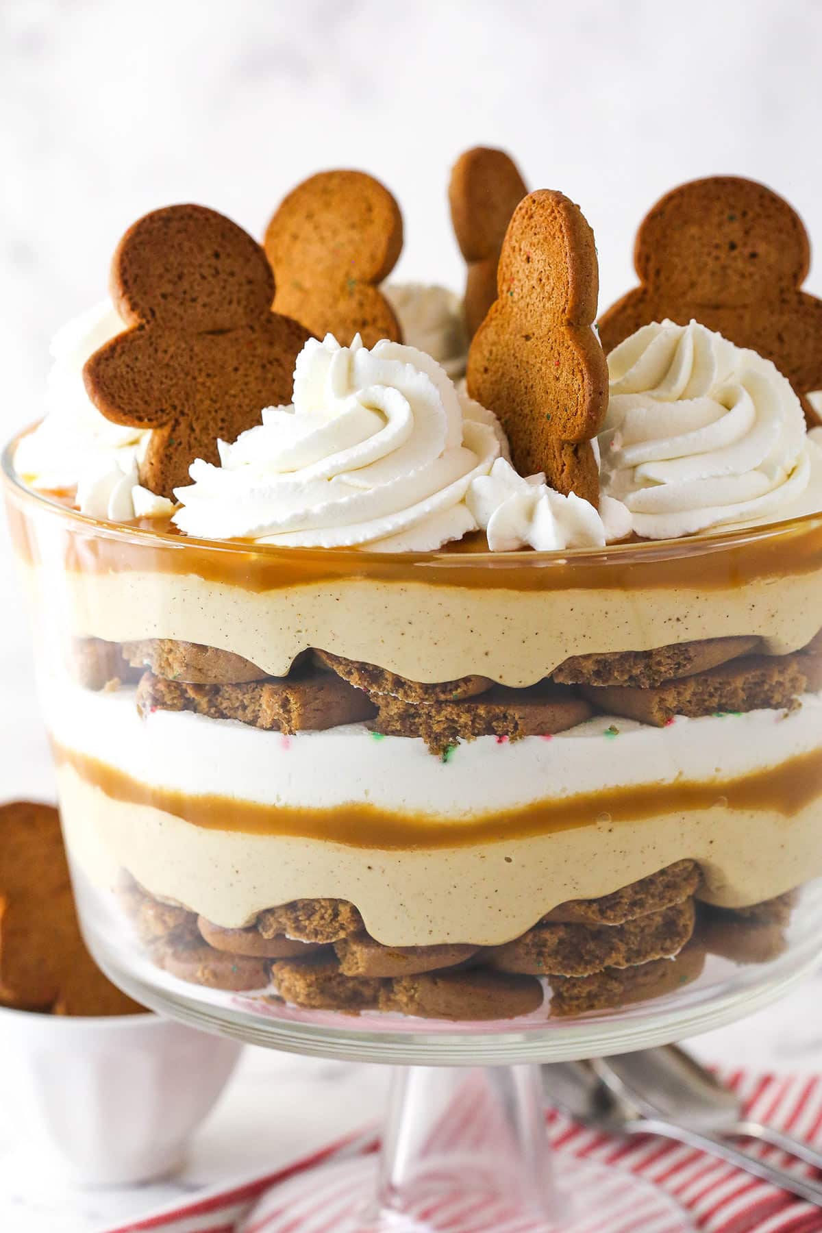 Gingerbread Cheesecake Trifle in a glass trifle bowl.