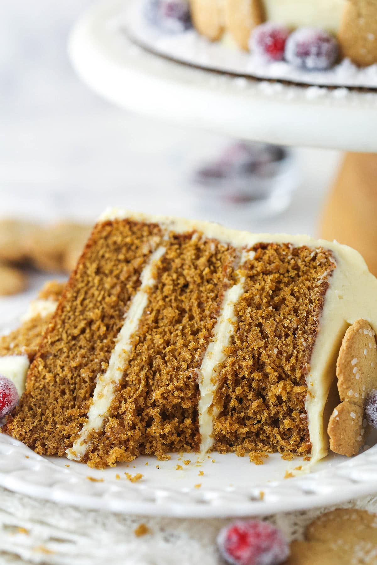 A slice of gingerbread cake with a bite taken out of it.