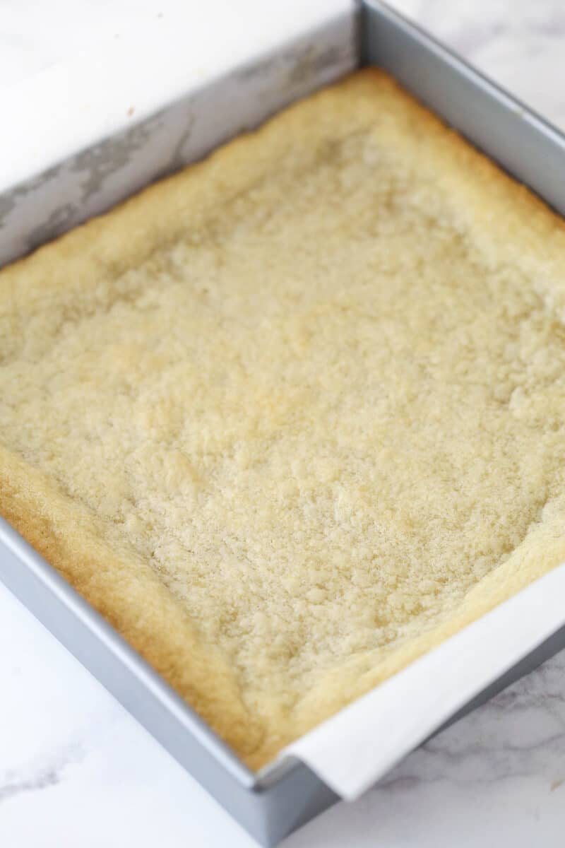 Sugar cookie bars baked in a baking pan.