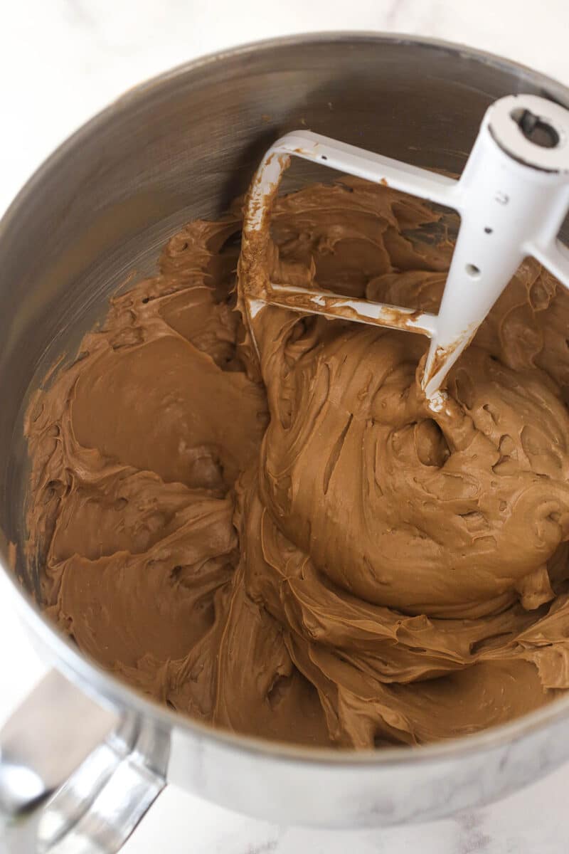 No-Bake Chocolate Cheesecake mixture in a silver mixing bowl.