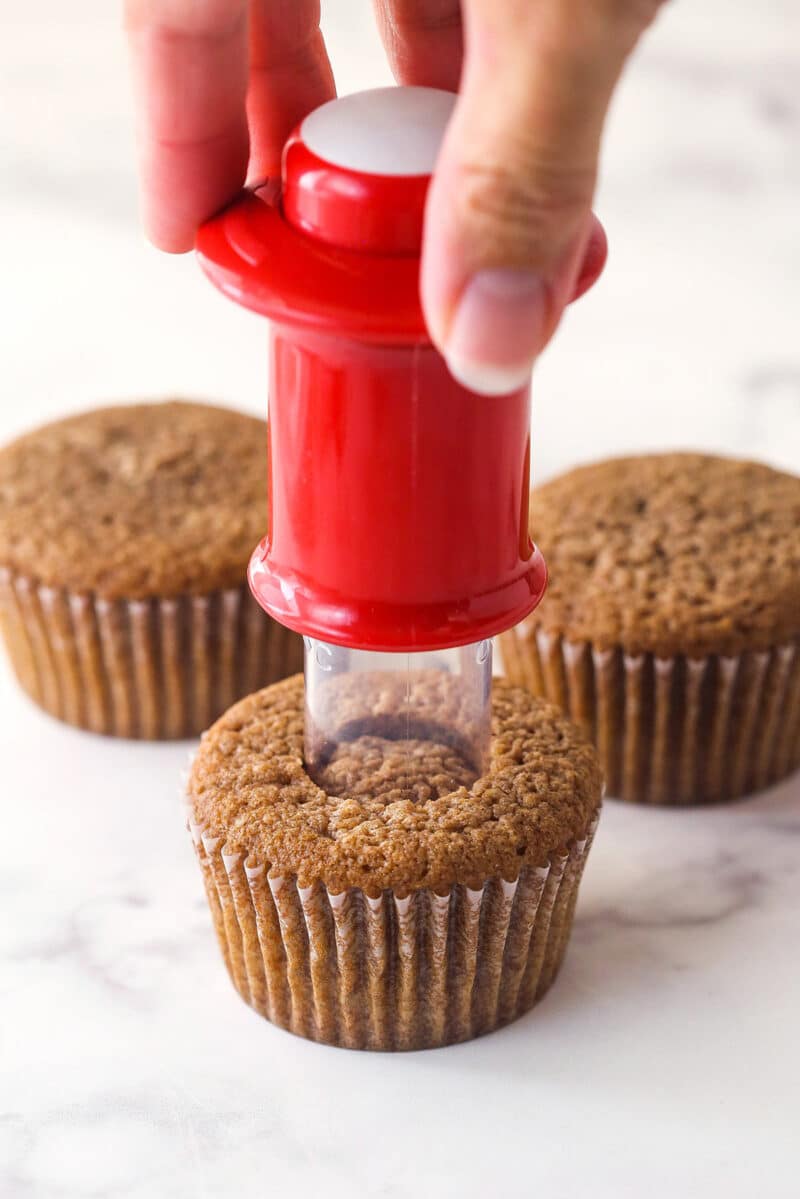 Coring a Nutella cupcake with a cupcake corer.