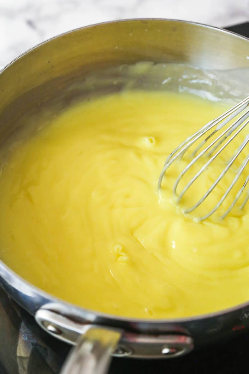 Cooking pastry cream until it thickens,