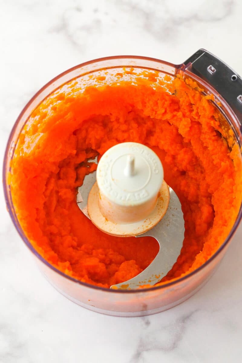 Pureed carrots in a food processor.