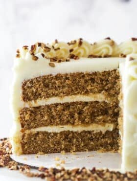 Close up of a Spice Cake with slices cut away to show layers.