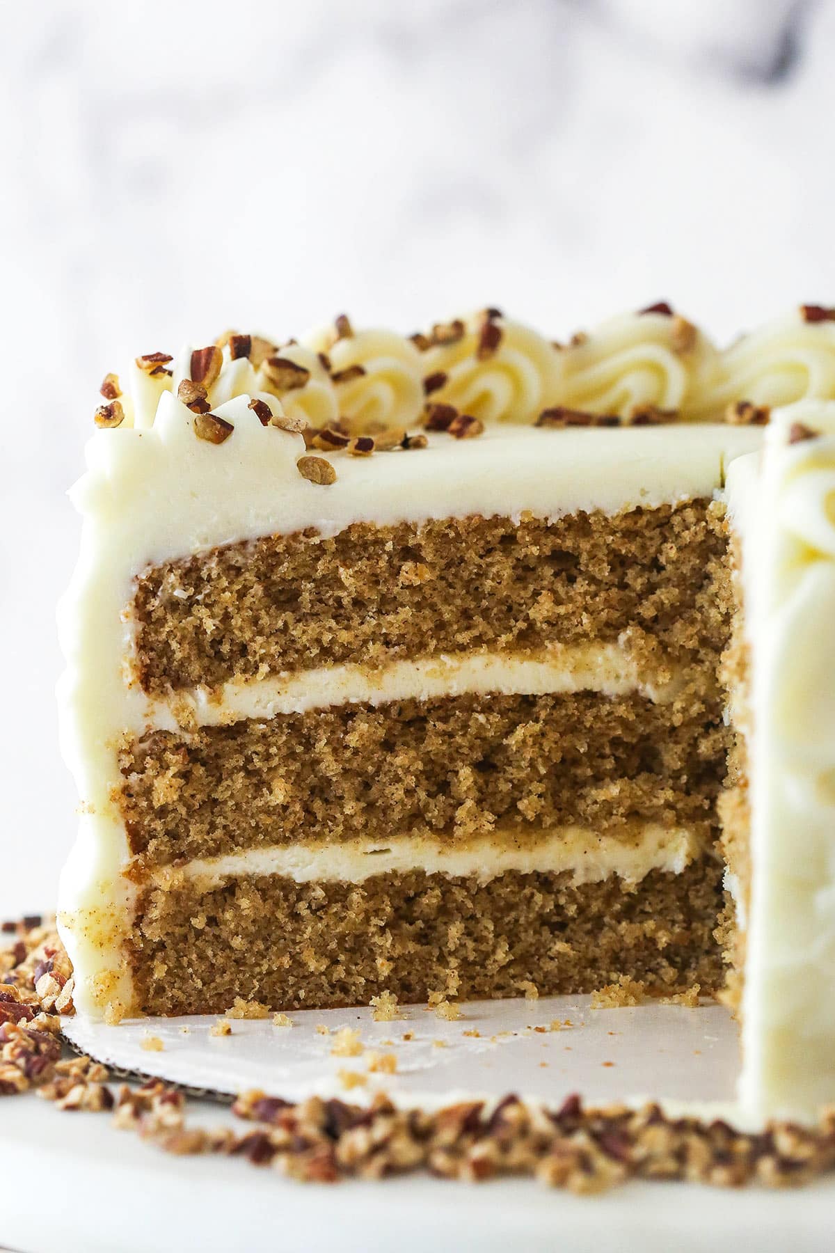 Close up of a Spice Cake with slices cut away to show layers.