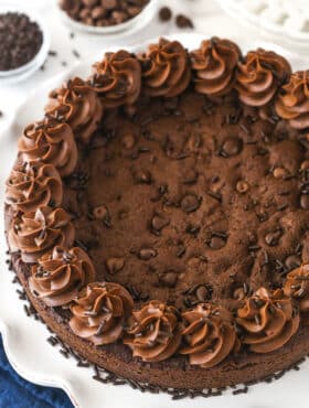 Overhead image of chocolate cookie cake on a serving platter.