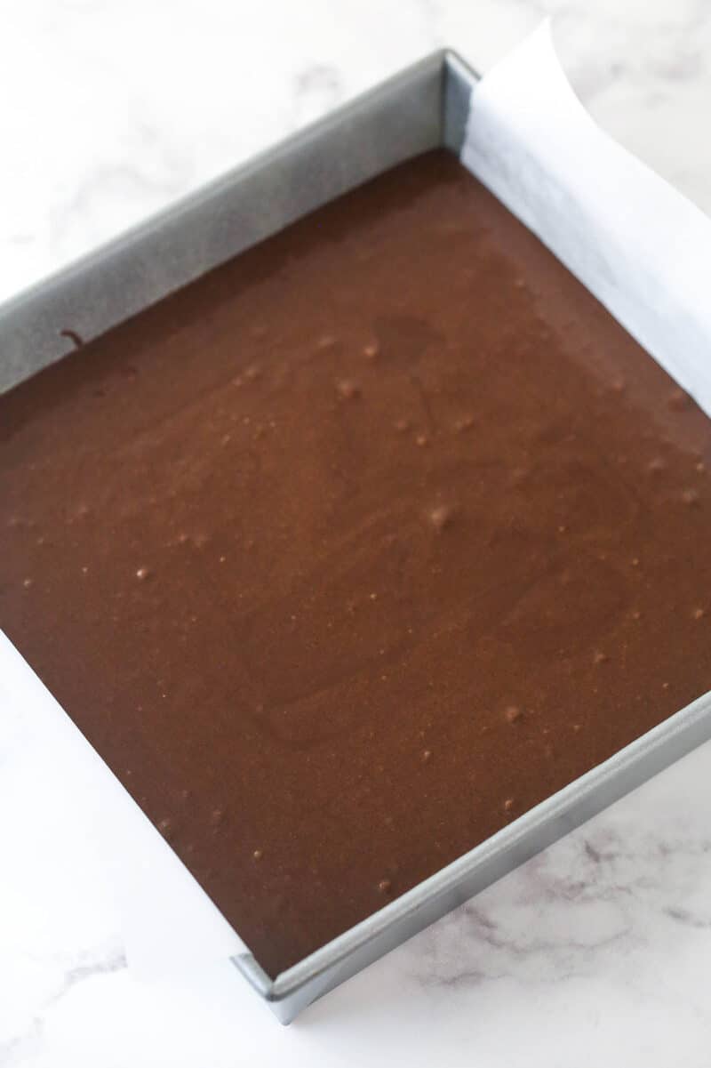 Brownie batter in a baking pan.