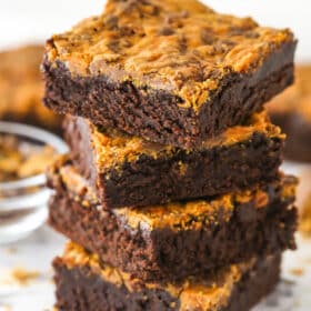 A stack of butterfinger brownies.
