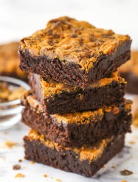 A stack of butterfinger brownies.