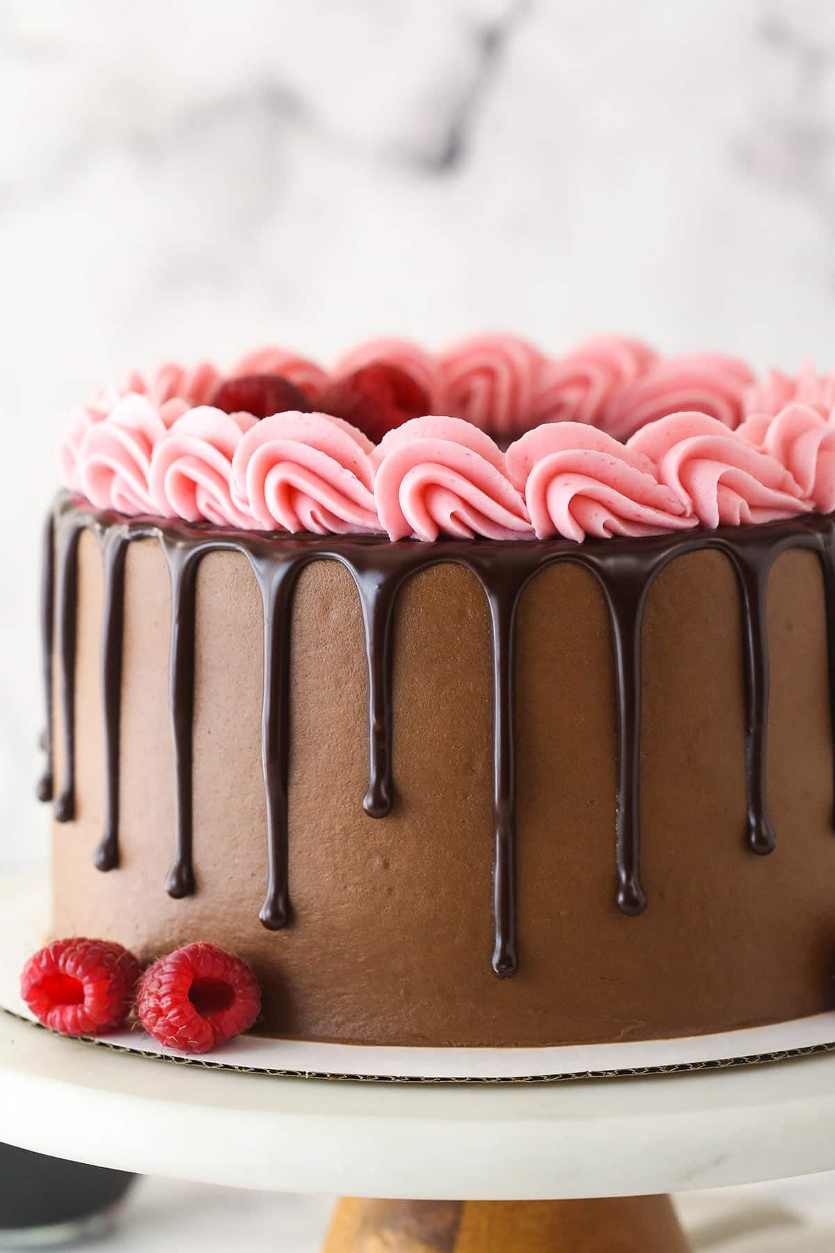 Red wine chocolate cake on a cake stand.