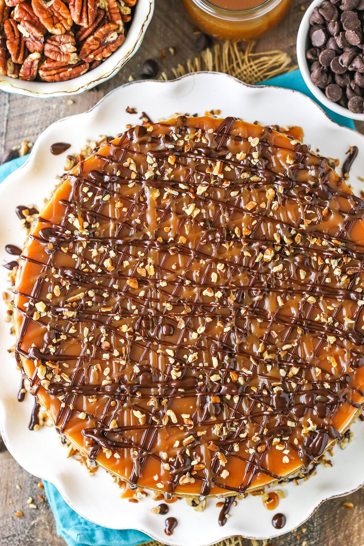 Overhead view of Turtle Cheesecake on a white platter